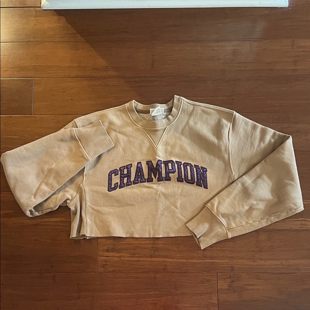 Champion Cropped Sweatshirt in Tan with Purple Logo